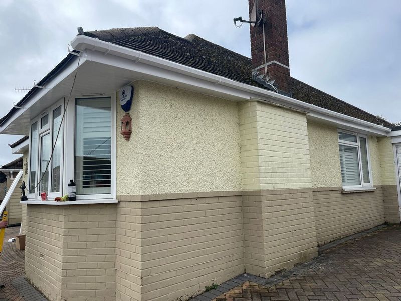 A completed re-roof on a Crawley semi-detached house, new tiles and ridge