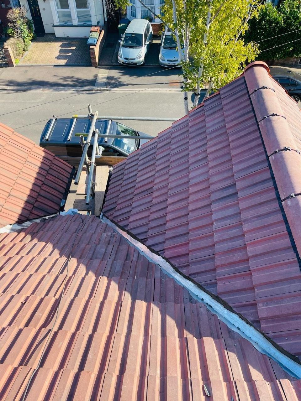 Hand-dressed lead flashing at a roof junction